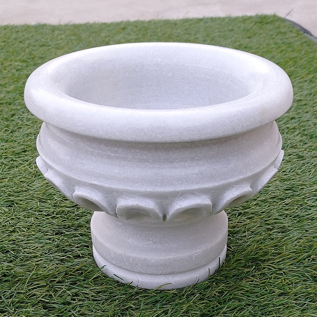 "Introducing Elegance in Every Curve: The Marble Round Planter Collection"